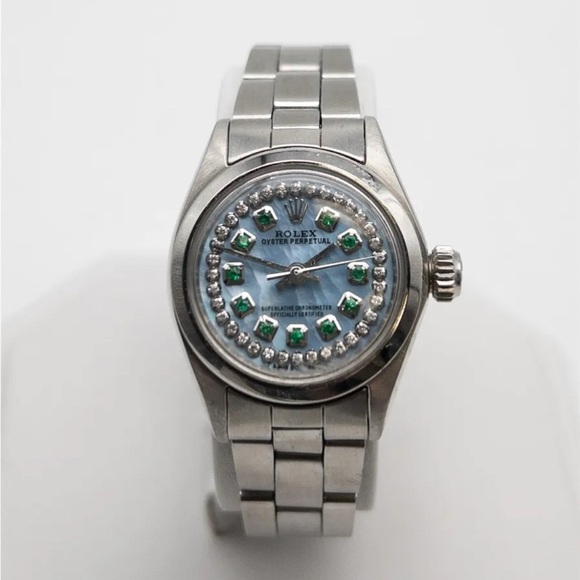 Rolex Accessories - Authentic and genuine ROLEX with all genuine EMERALDS and DIAMONDS surrounding.
